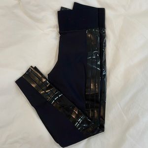 Ultracor Black Leggings with black stripes down sides